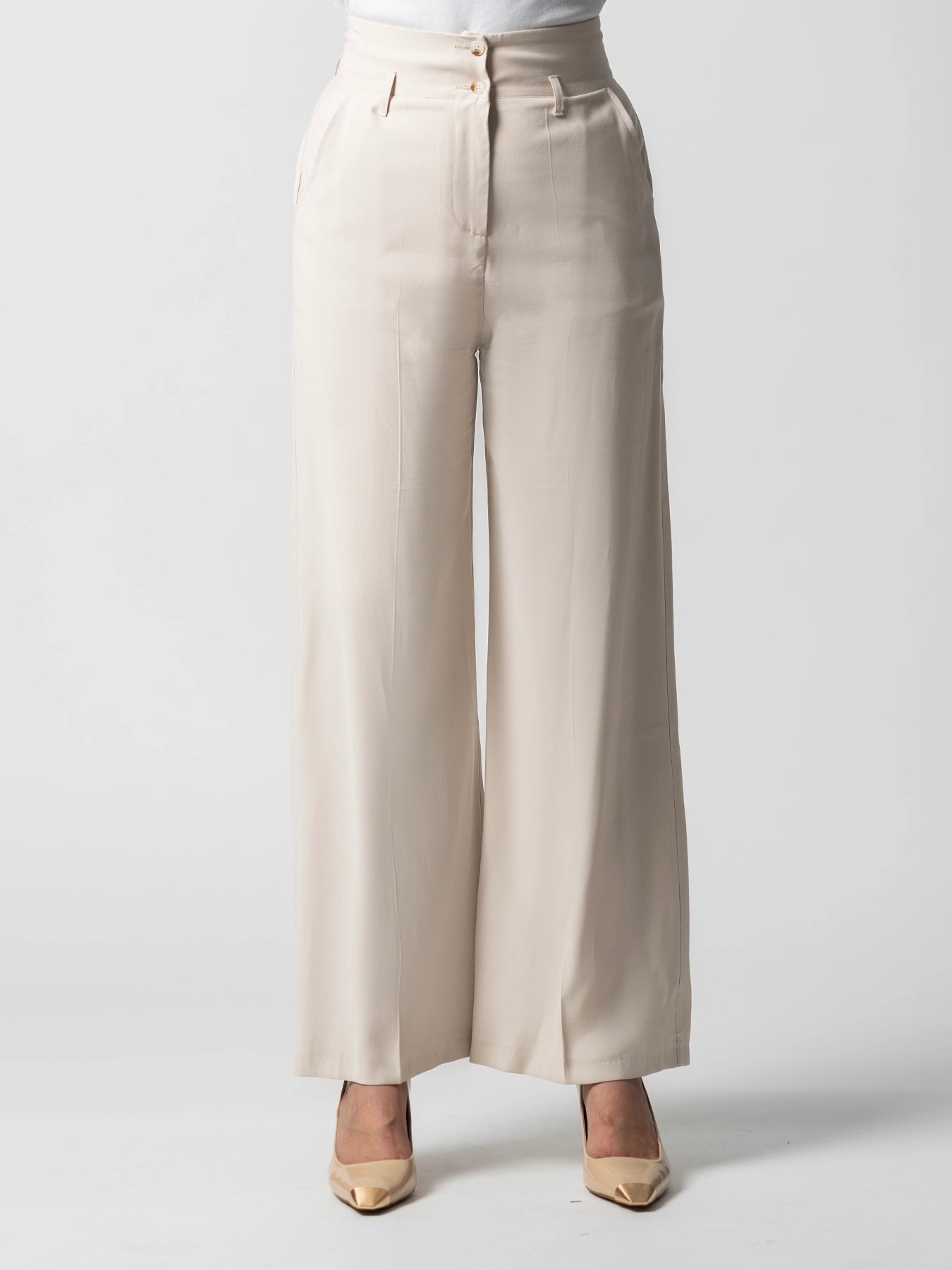 شلوار زنانه کرم پارچه ای مدل بگ کمرپل دار 