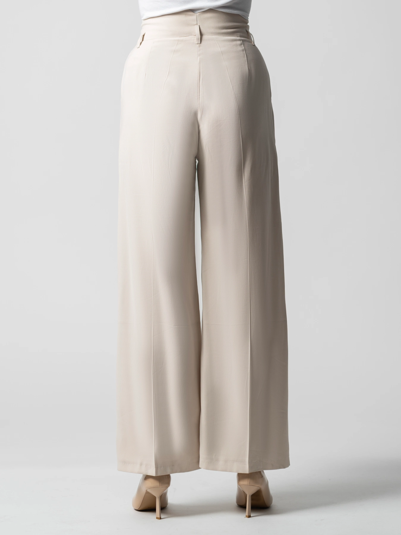 شلوار زنانه کرم پارچه ای مدل بگ کمرپل دار 