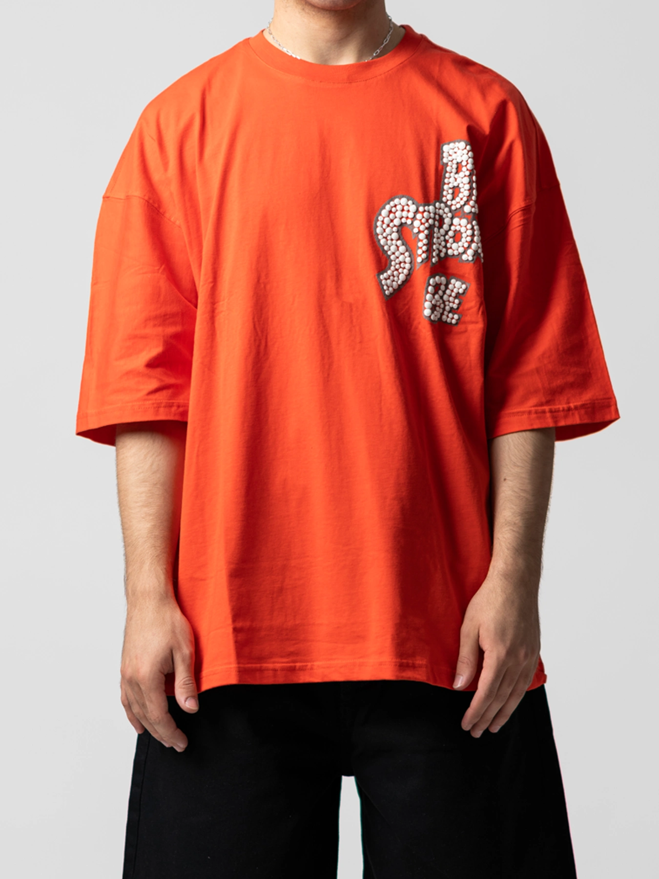 تیشرت نارنجی طرح دار یقه گرد طرح دار