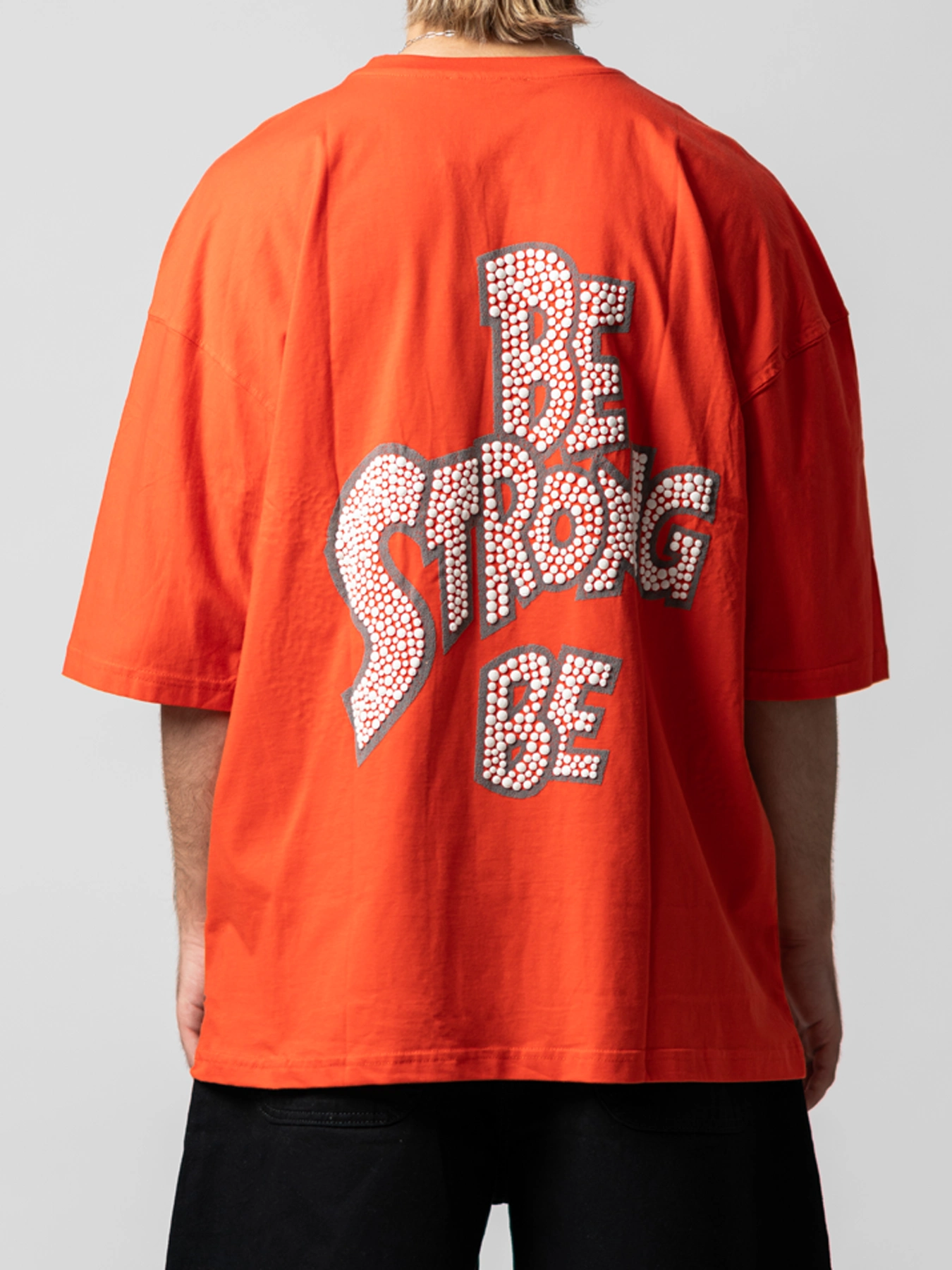 تیشرت نارنجی طرح دار یقه گرد طرح دار