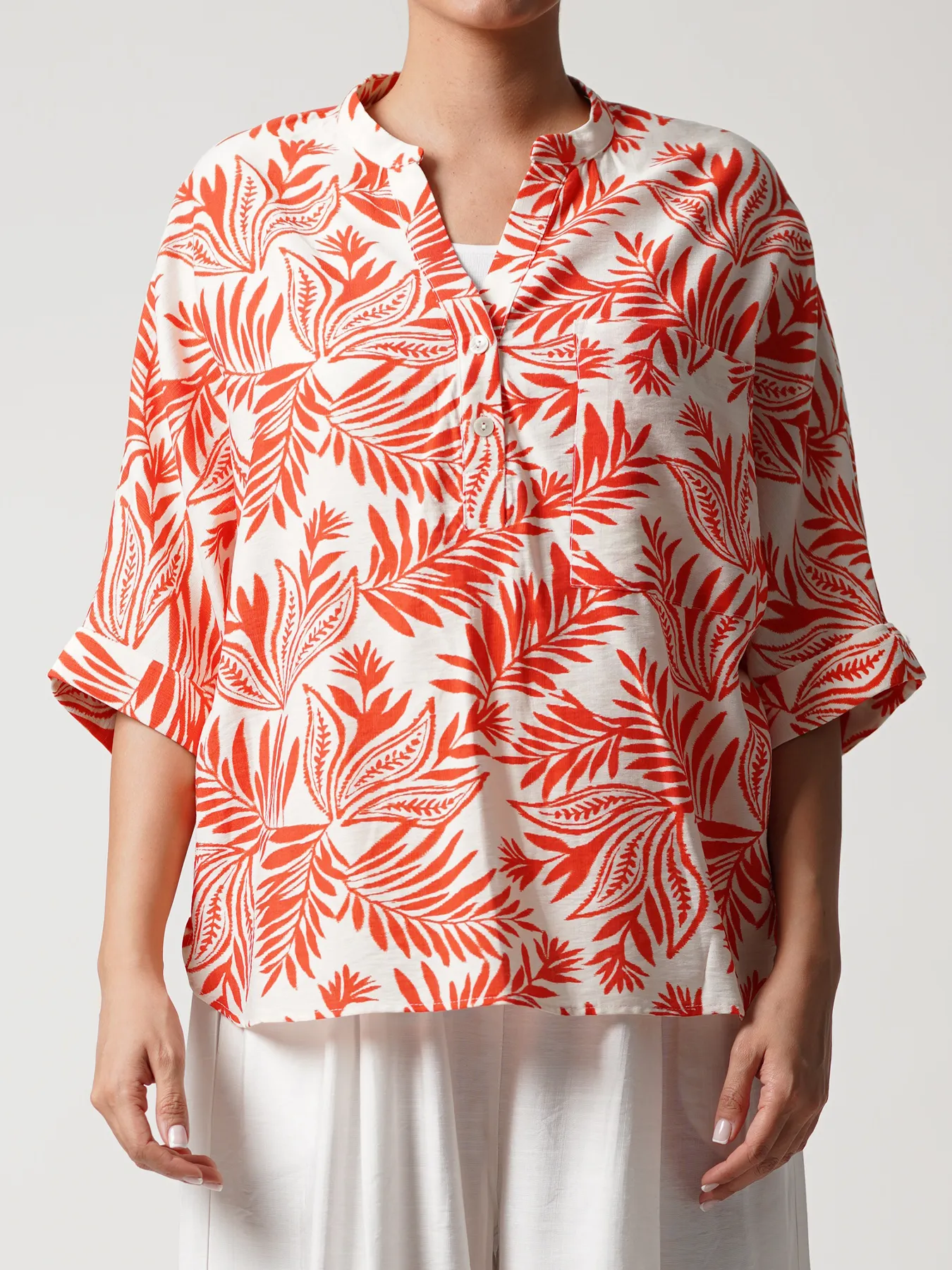 بلوز زنانه سفید نارنجی طرح هاوایی