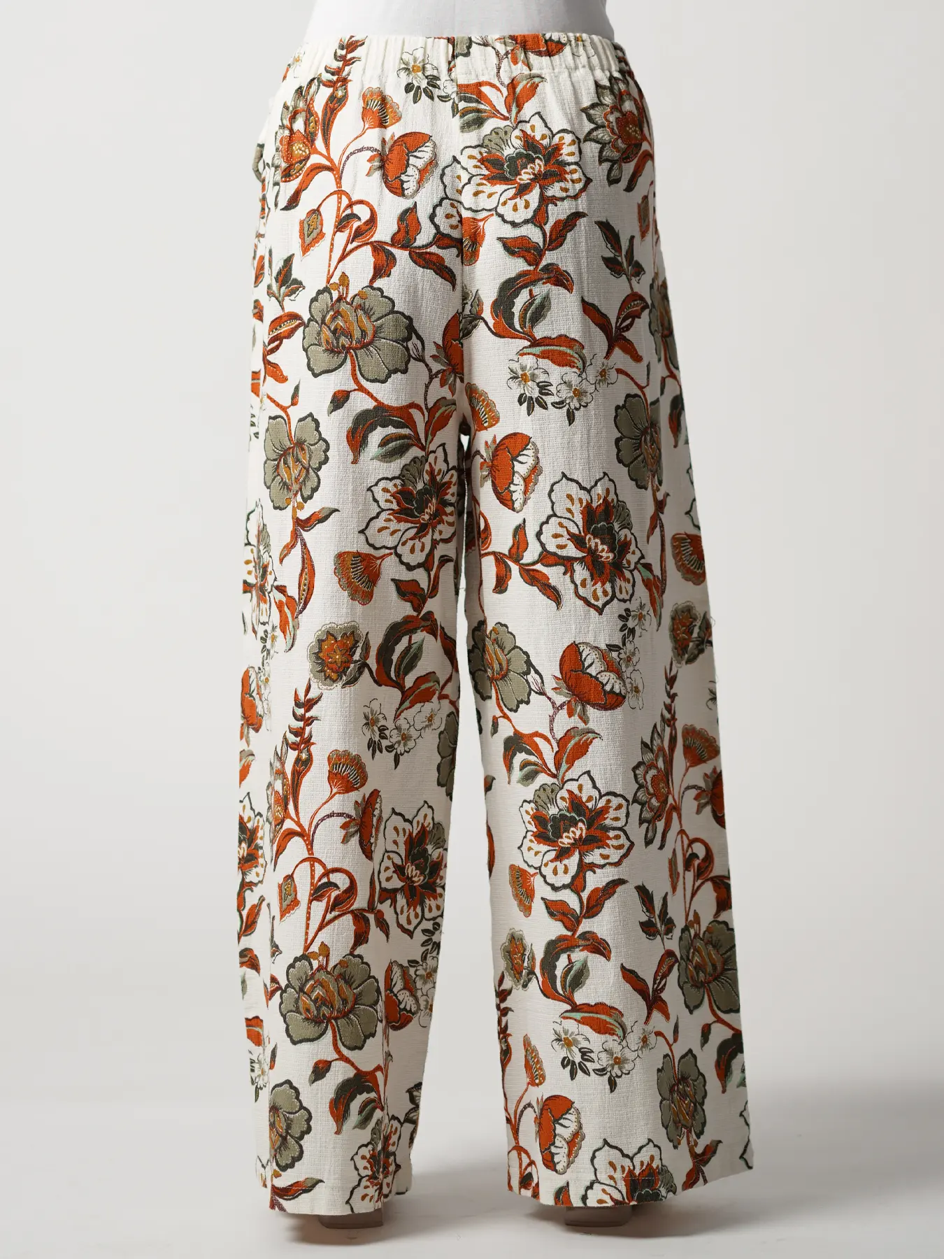 شلوار شیری قهوه ای طرح گل و برگ کمربندگره ای 