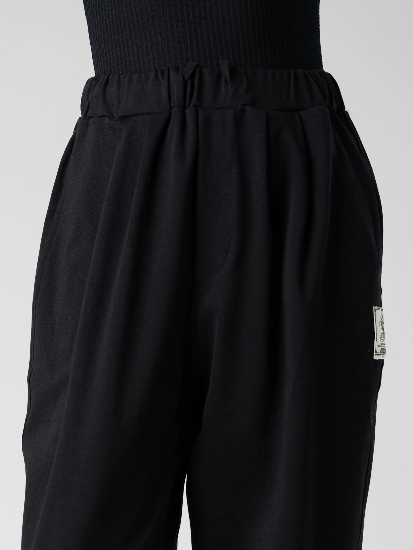 شلوار مشکی کمرکش بندار 52